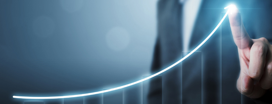 A blurry image of stairs and the top of a building.